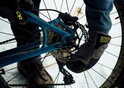 Mechanic adjusting a cycle pedal as part of a Bike Repair Los Angeles service